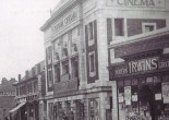 The beautiful building was demolished and now shops stand in its place
